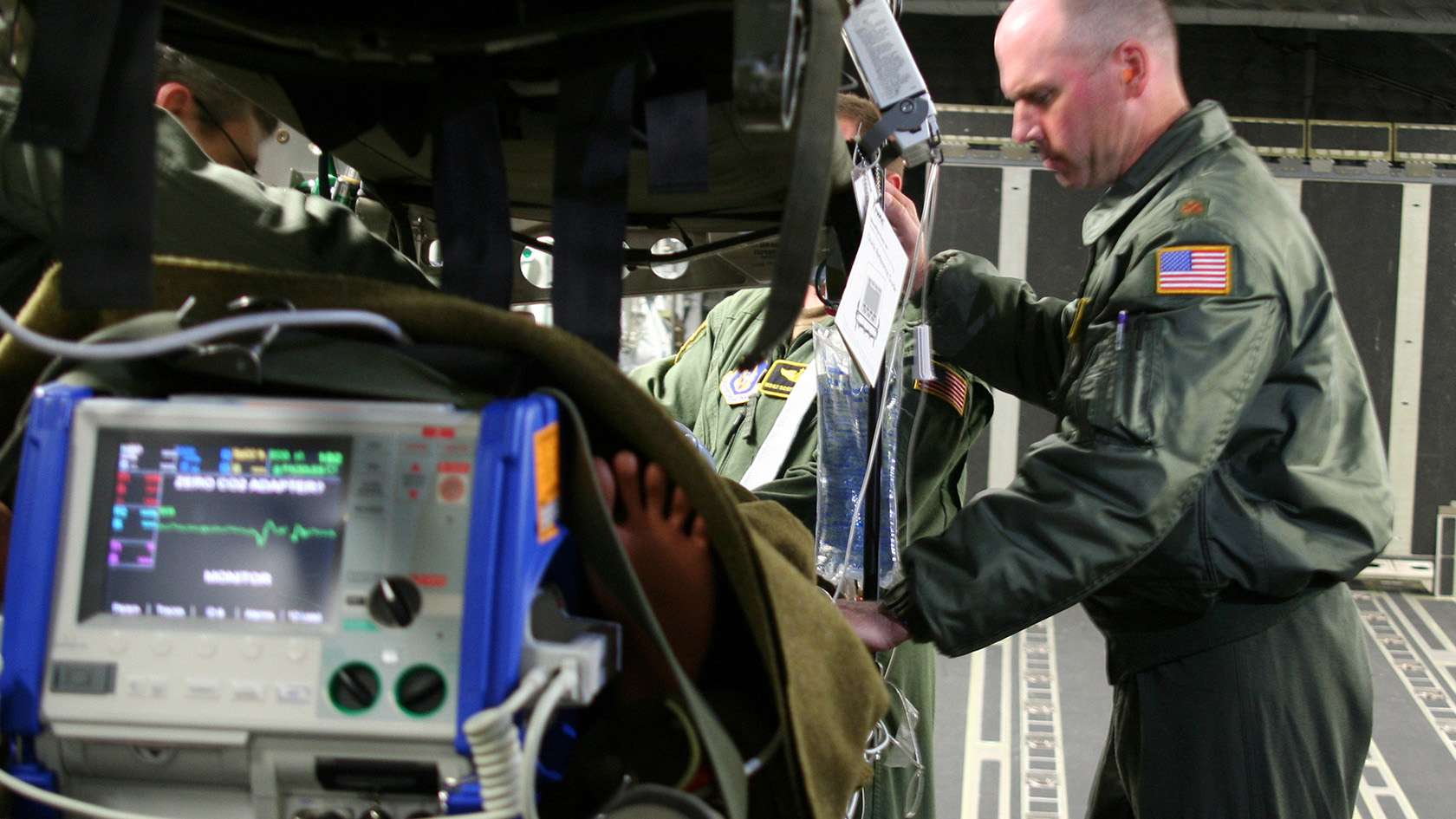 air force flight surgeon with equipment
