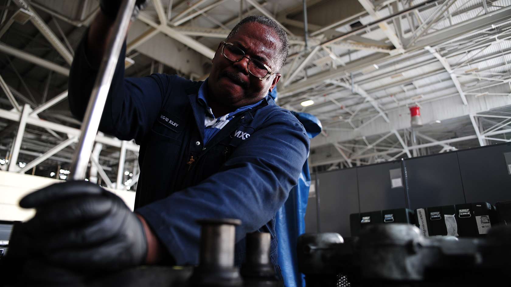 airman performing maintenance