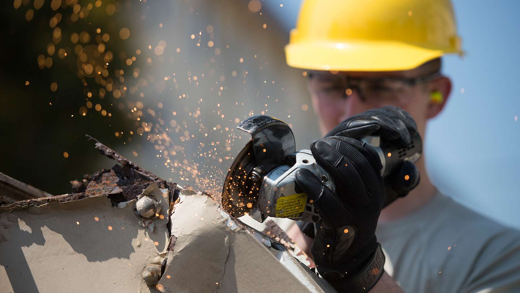 airmen with a grinder