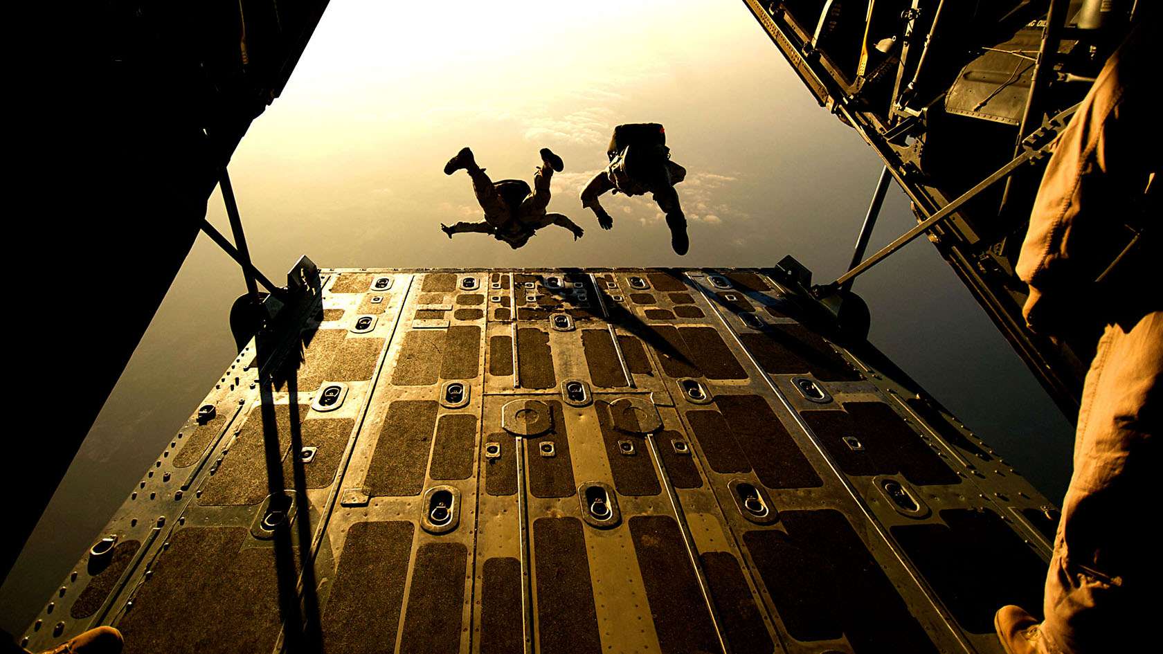 Two Special Warfare Airmen parachuting