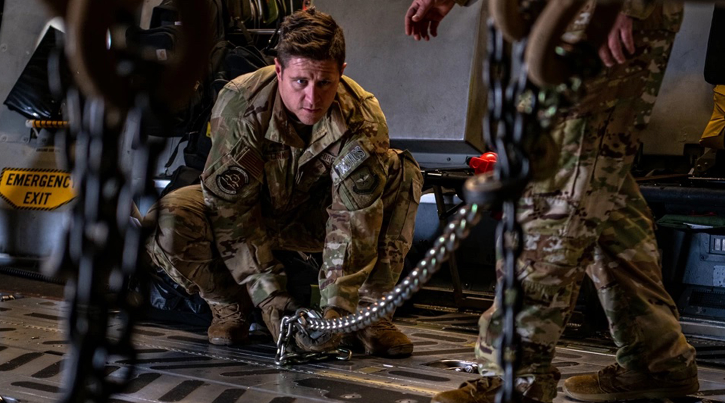 airmen working on aircraft