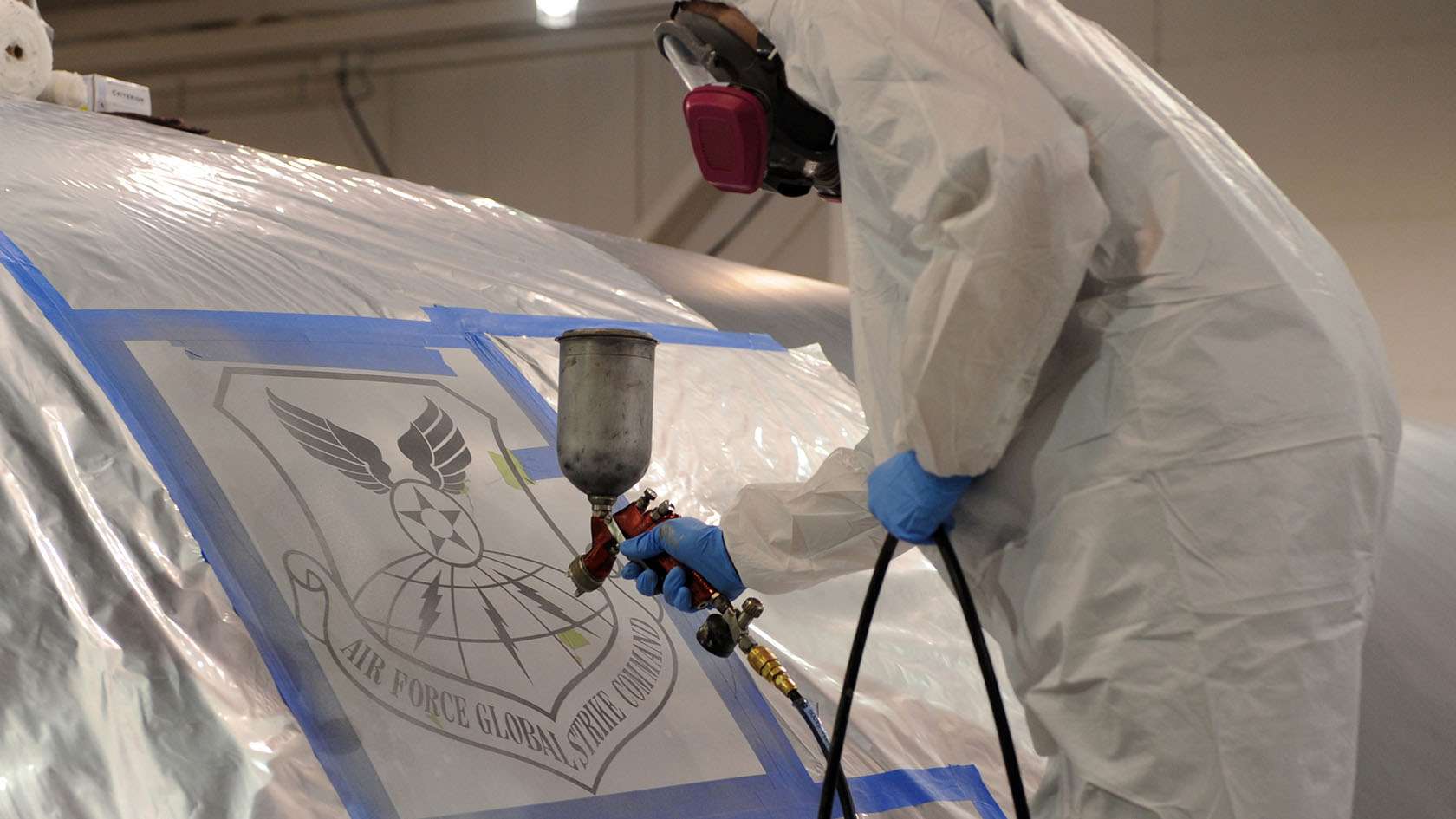 airman performing maintenance