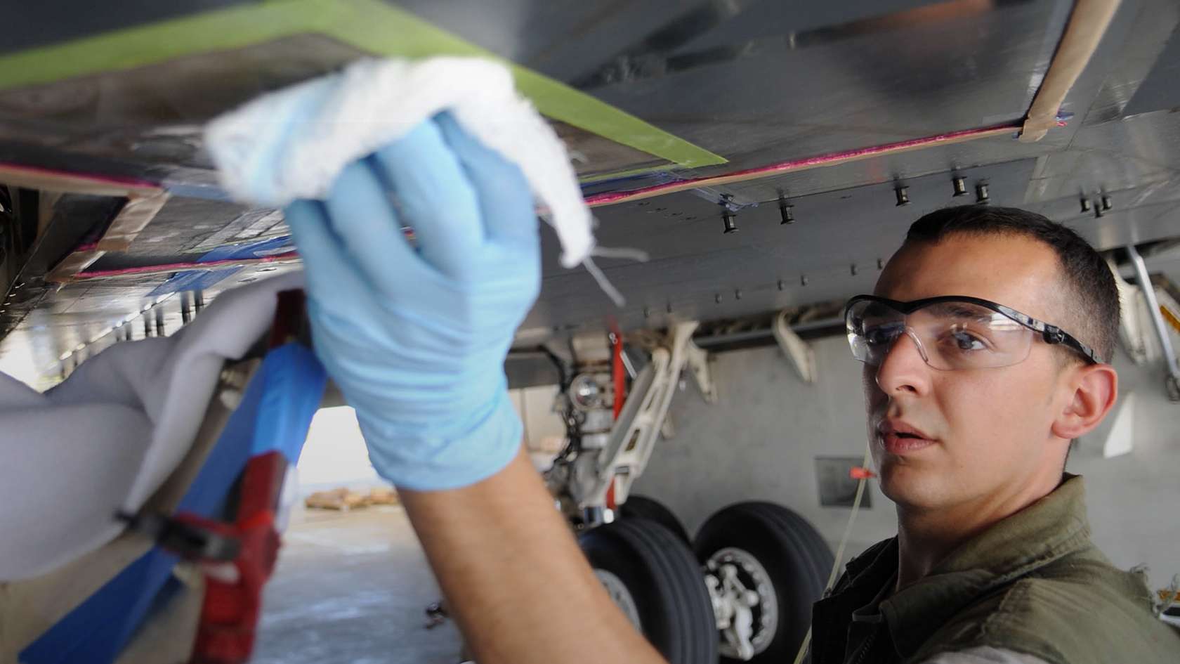 airmen performing maintenance work