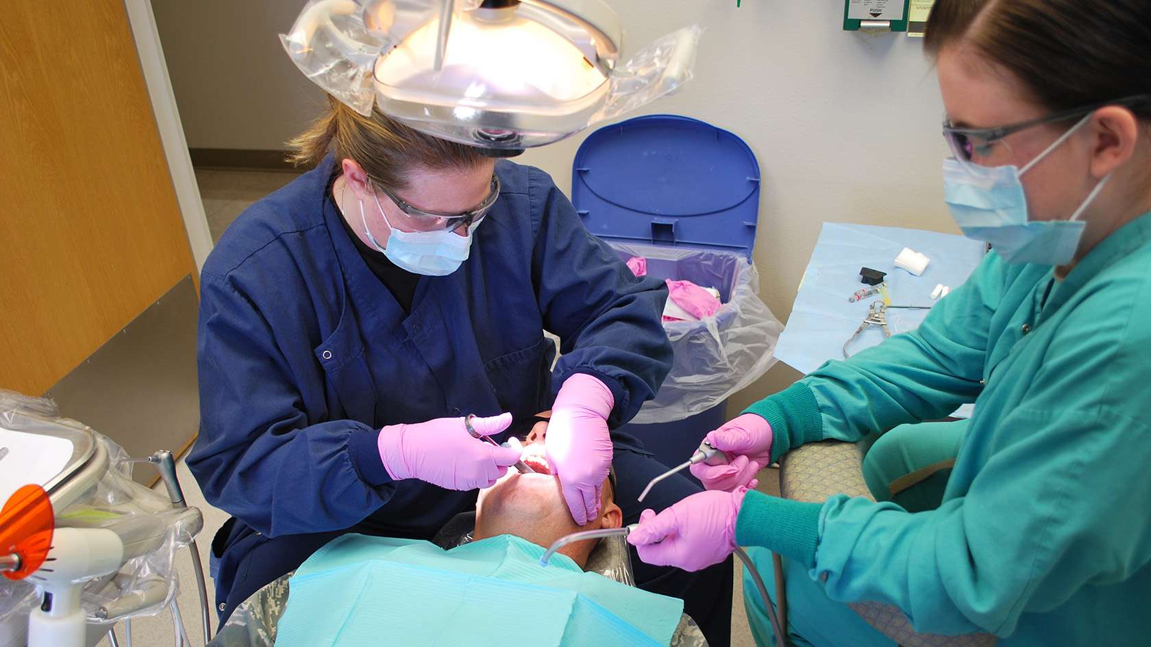 periodontist with patient