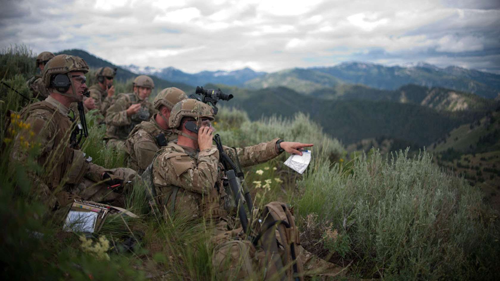 Group of TACP officers gazing over a mountainside