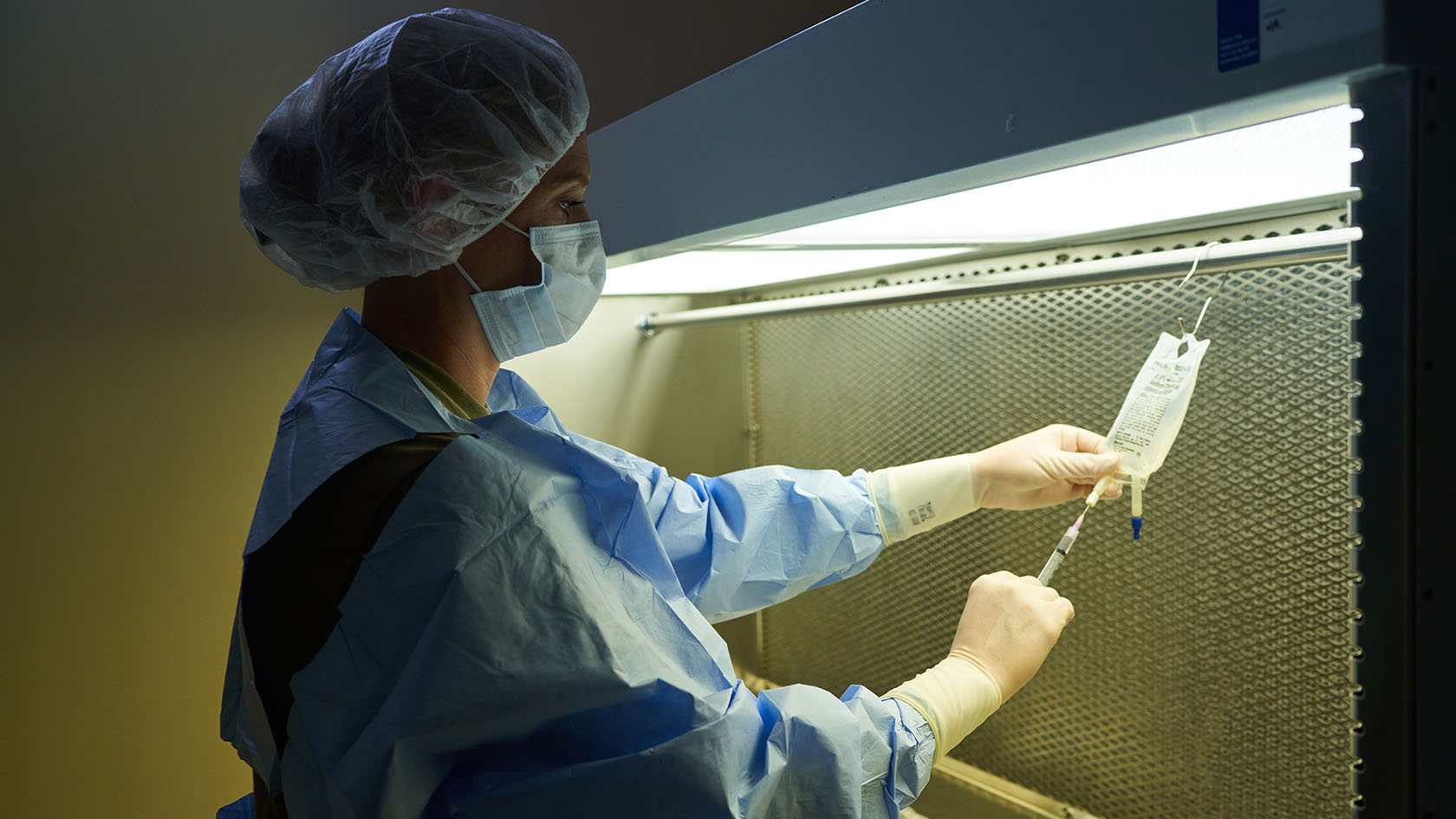 pharmacist measuring medicine dosage