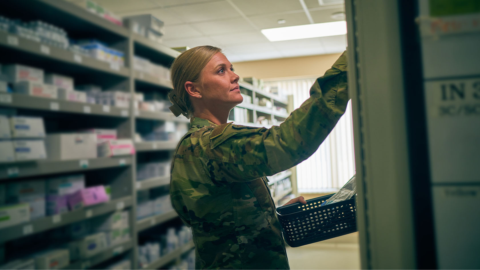 airforce pharmacist looking at medication