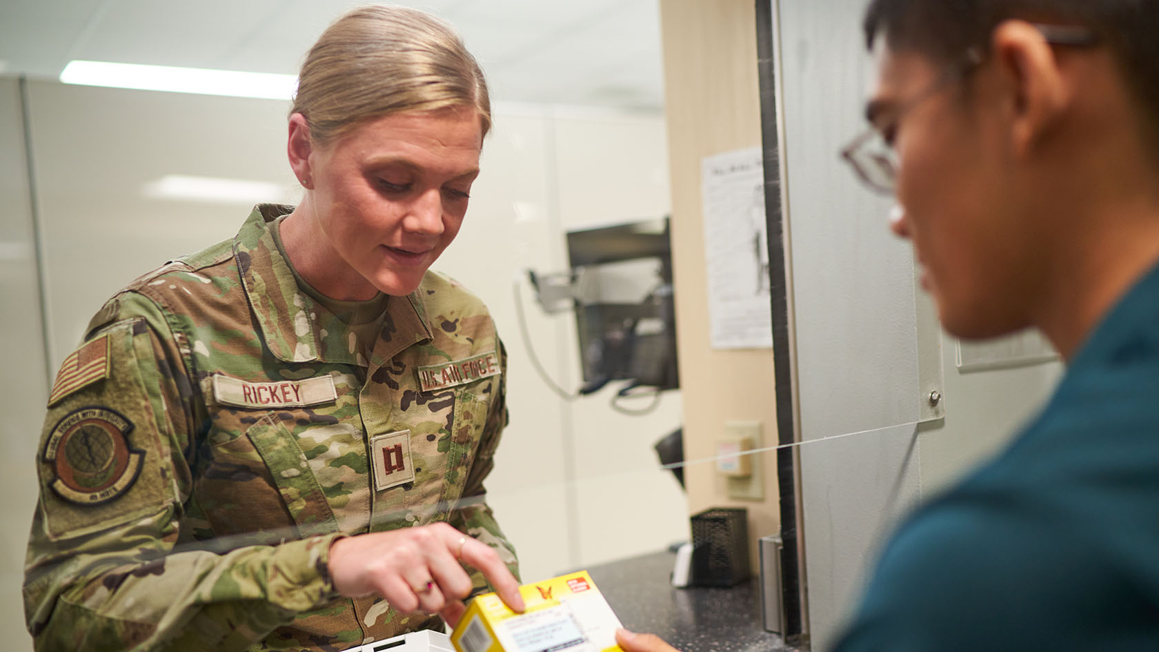 airforce pharmacist fulfilling prescriptions