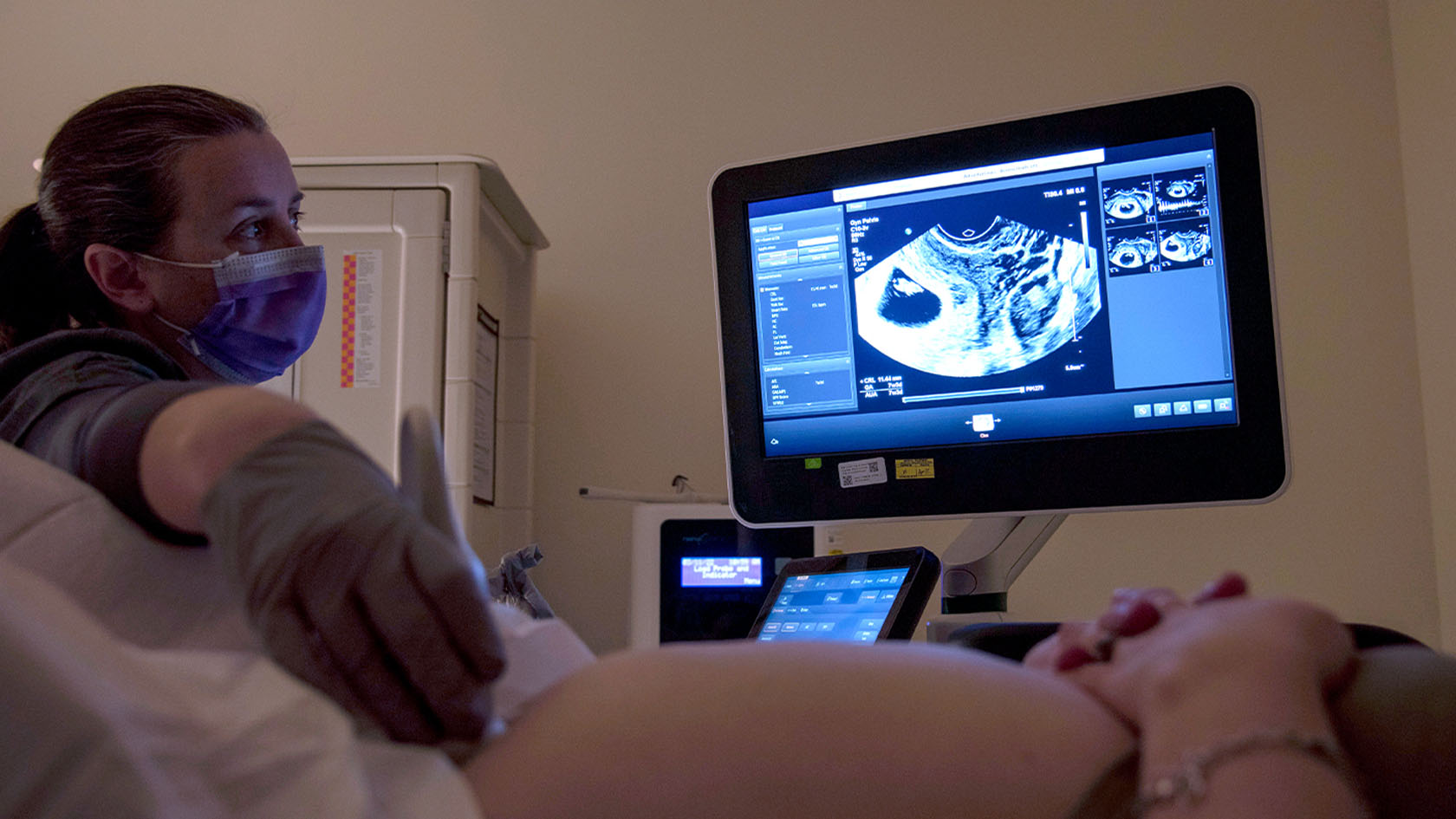 Nurse practitioner with patient