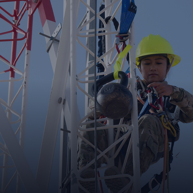 airman working on antenna