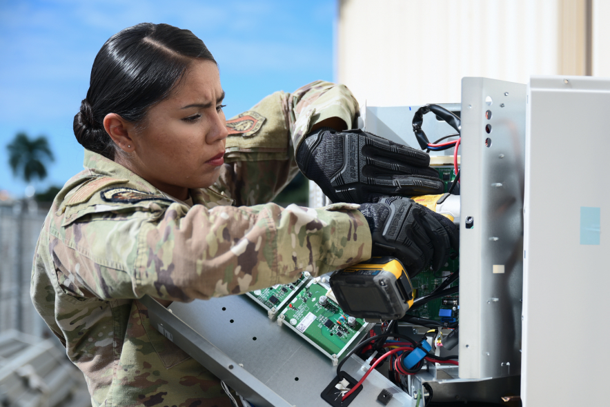 Airman working with drill