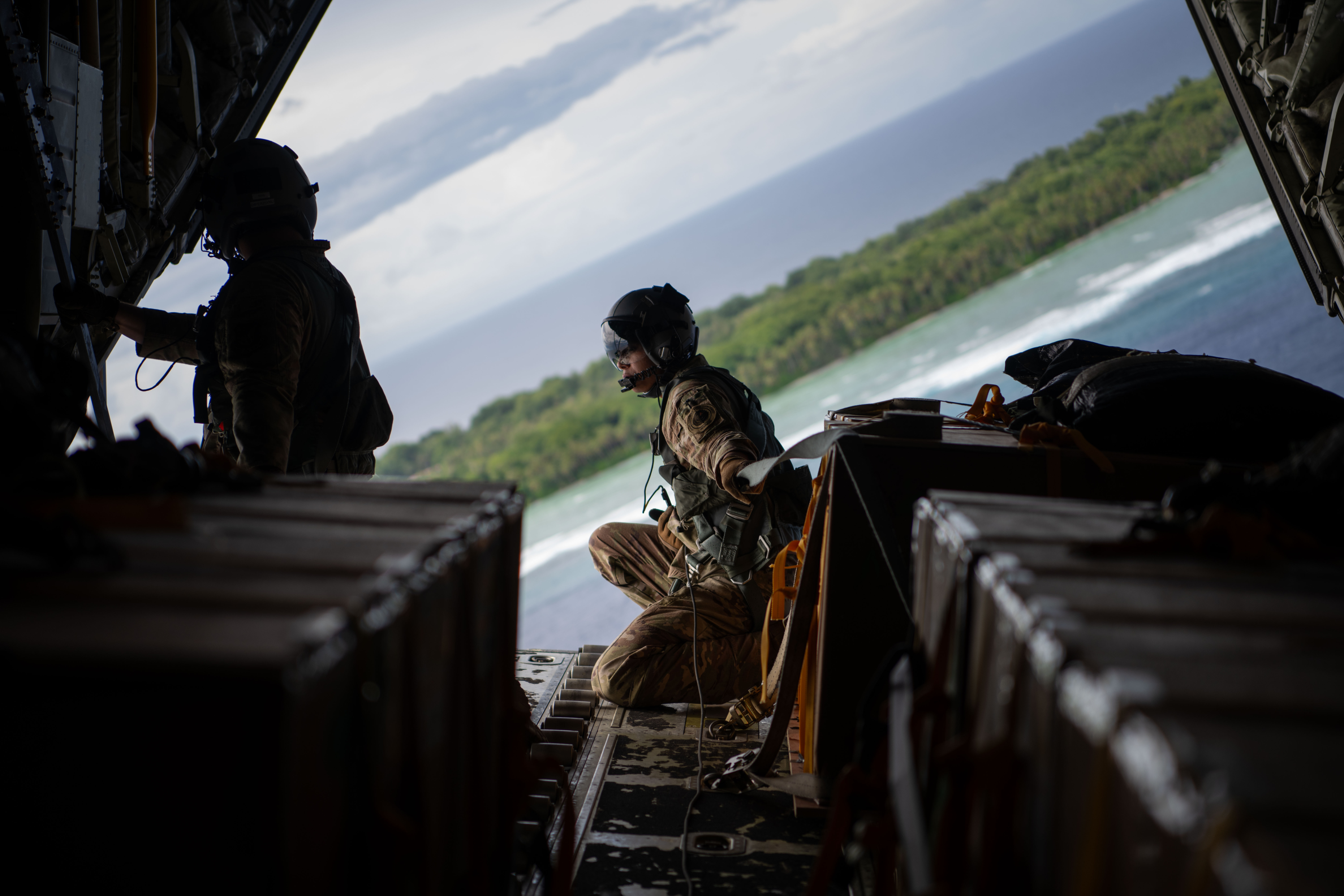 Air Force plane dropping humanitarian packages
