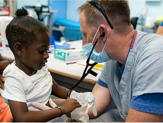 a doctor with a child