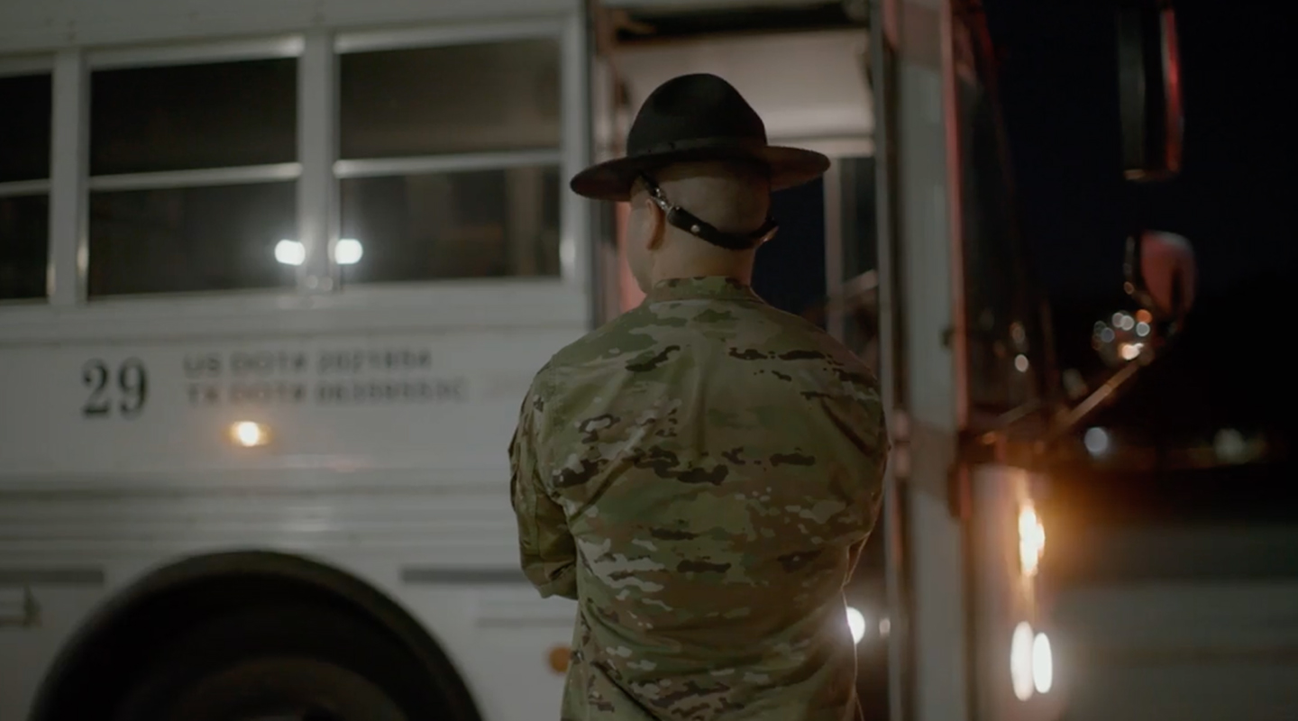 MTI waiting for trainees to get off the bus during arrival night