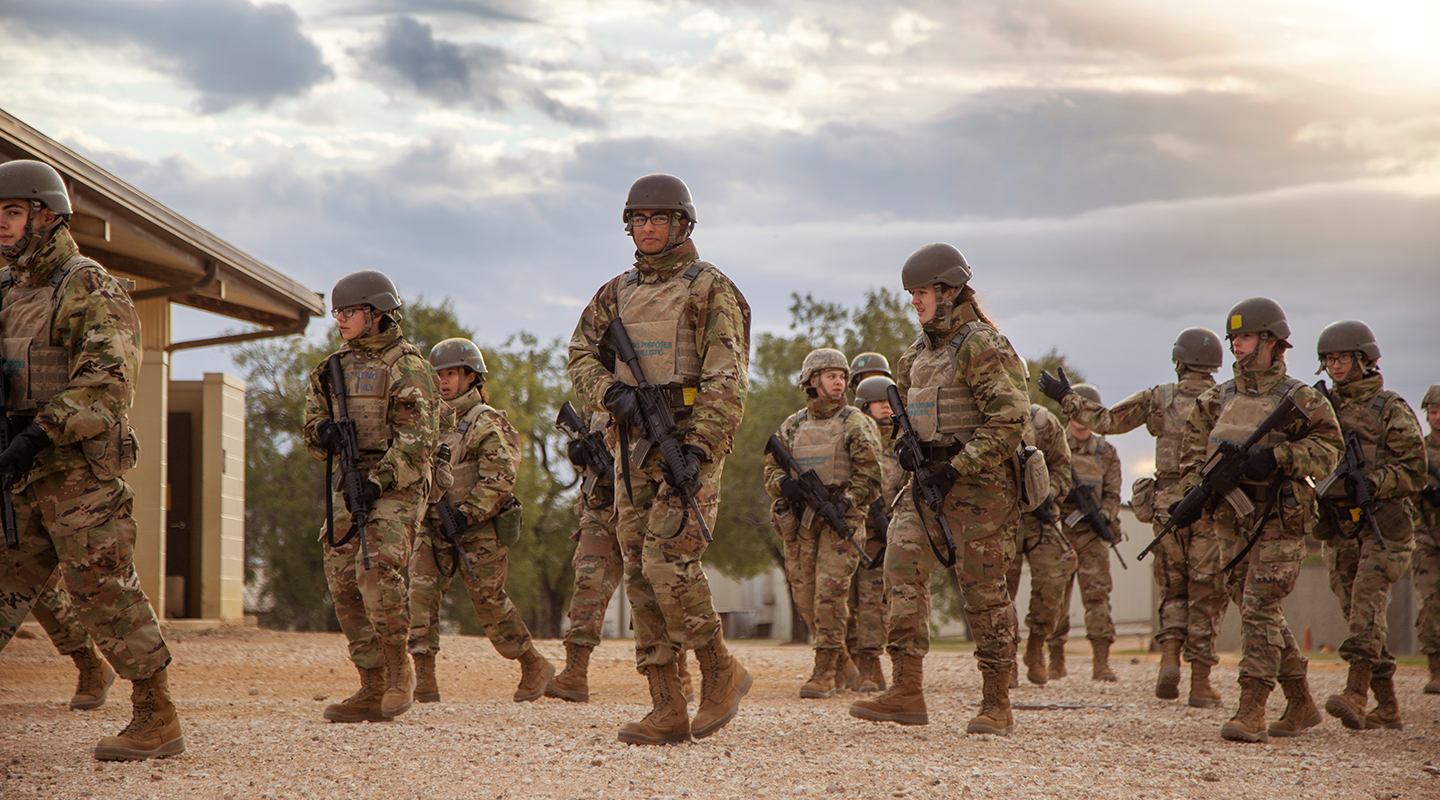 trainees in field scoping out the terrain
