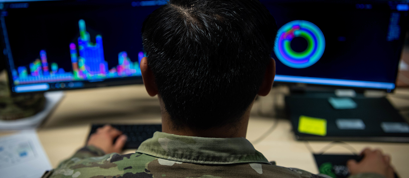 airman working in front of a computer screen