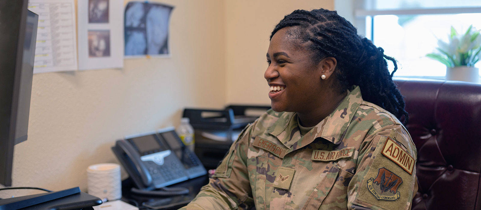 airman in front of a computer