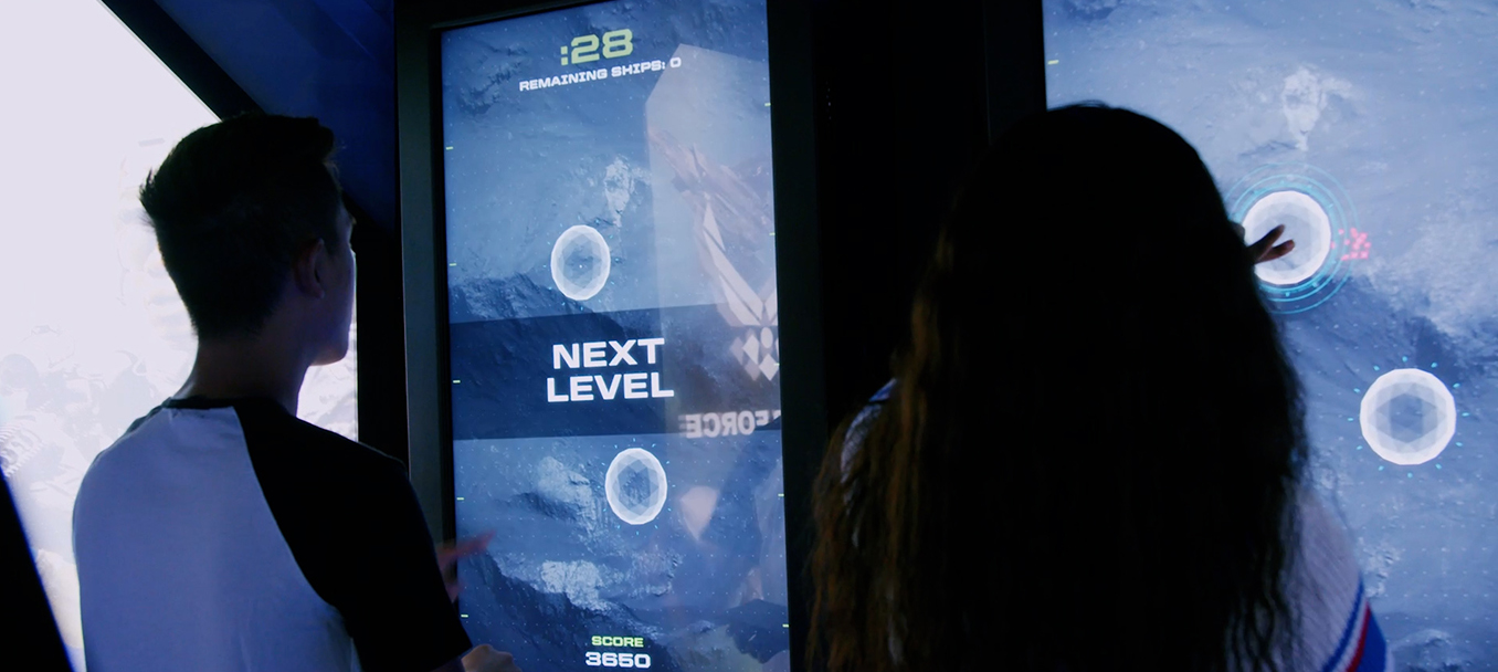 People playing an interactive game at an Air Force Event