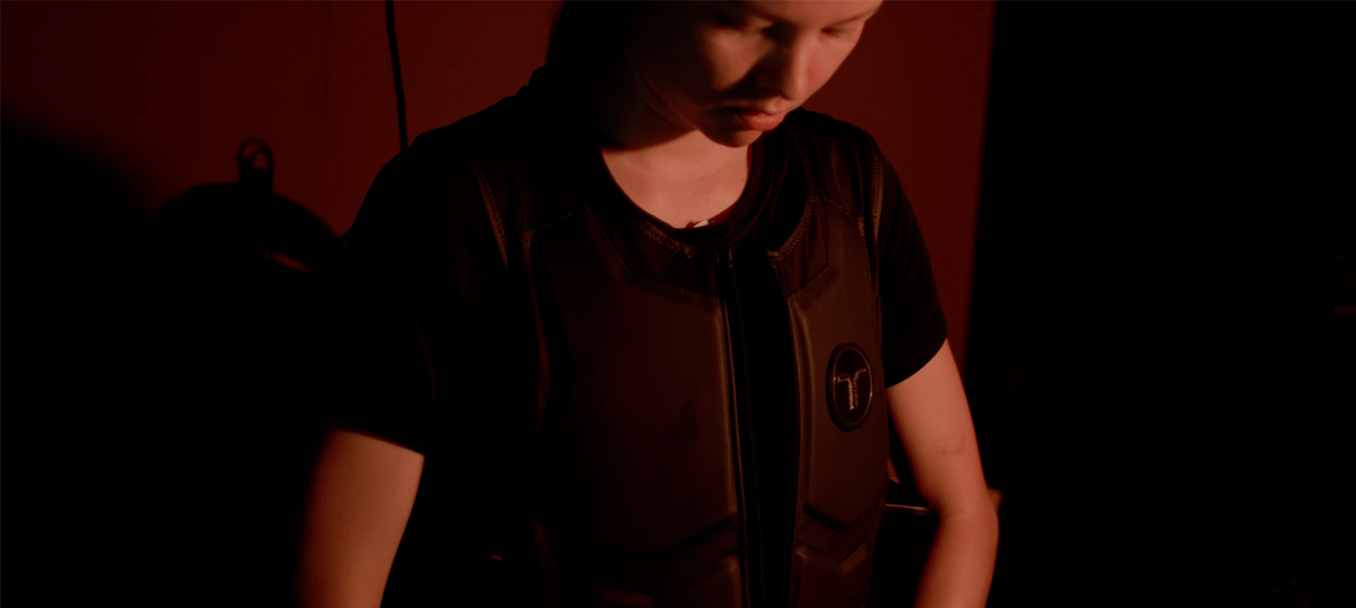 female wearing vest at an USAF event