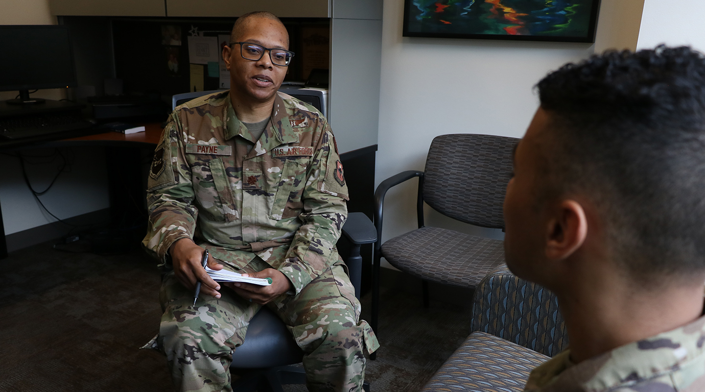 mental health service airman talking to a patient