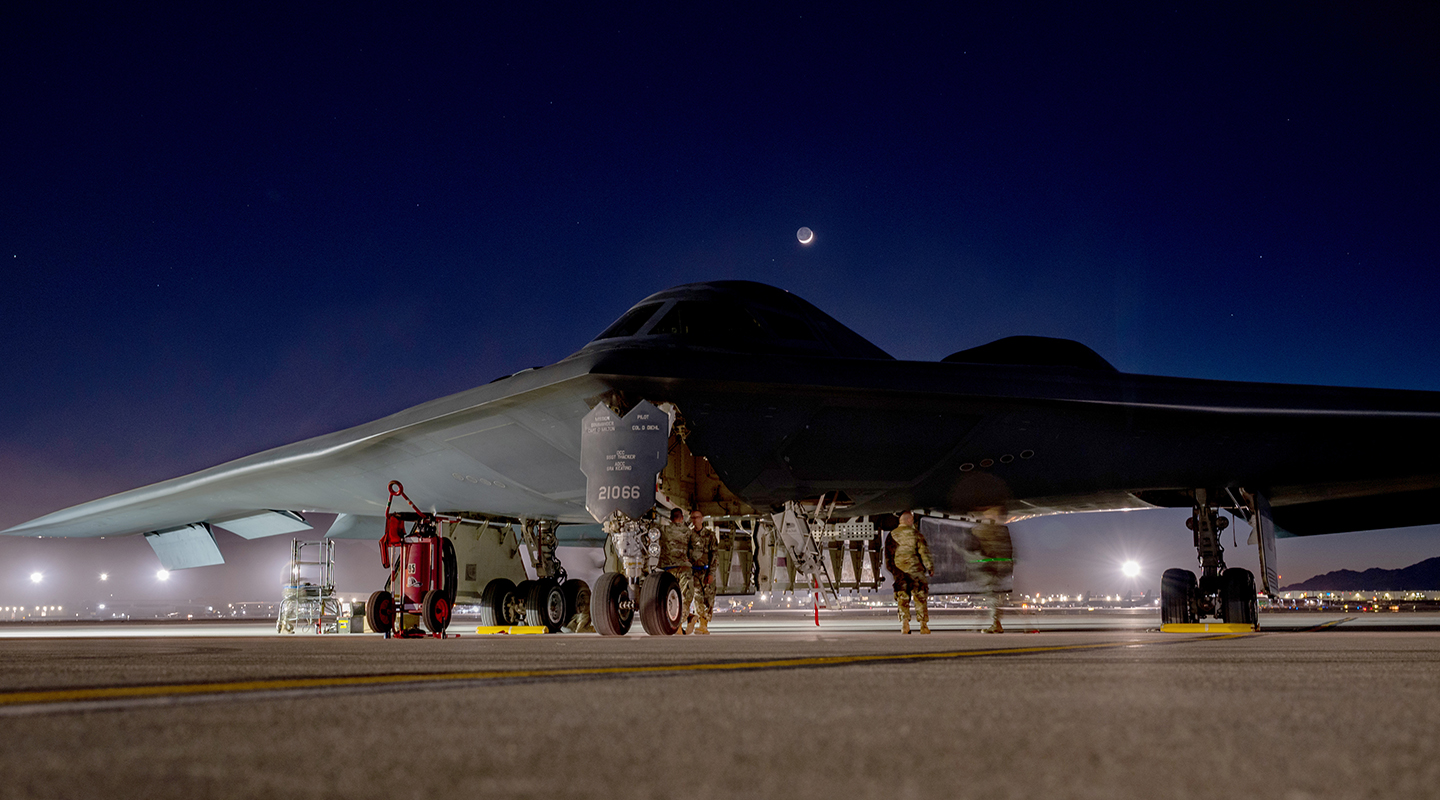 airmen repairing aircraft structure