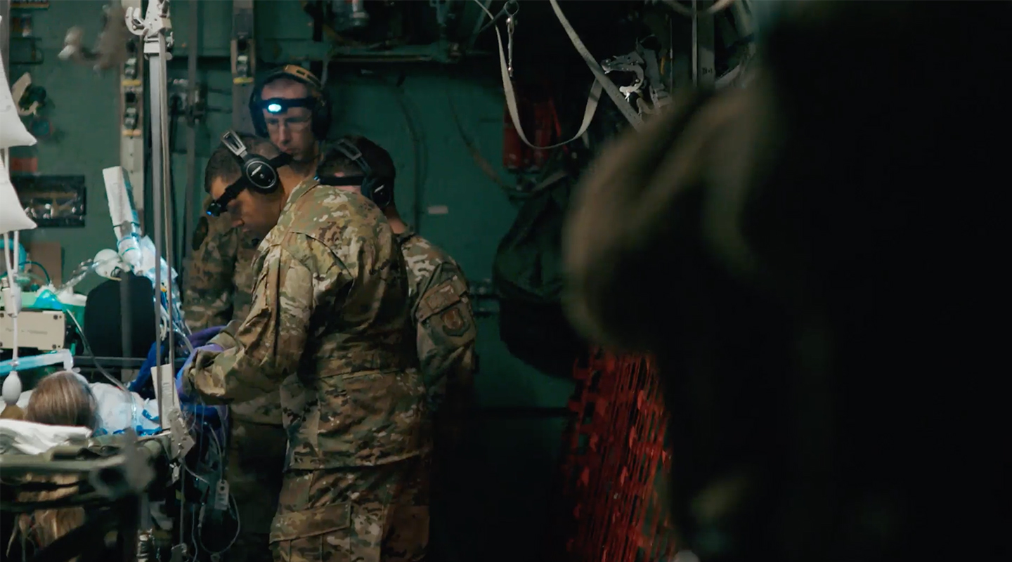 critical care nurses working with a patient