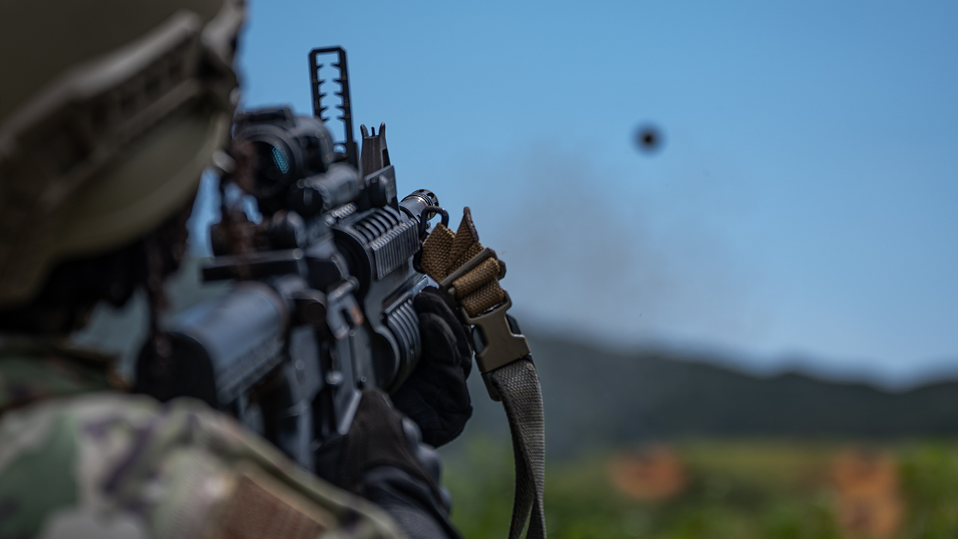 a firearm shooting towards a target