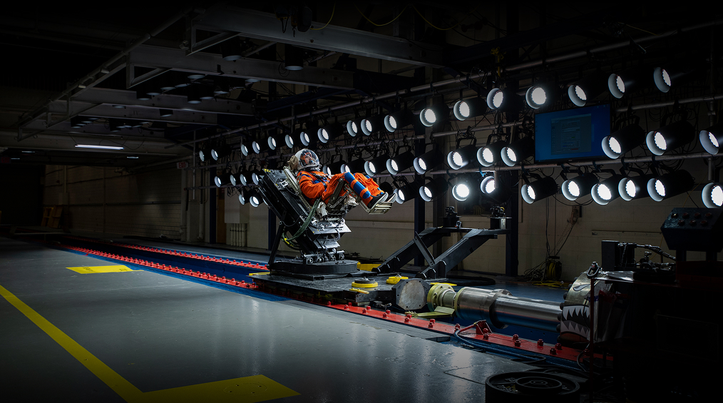 Airman in space simulation chair
