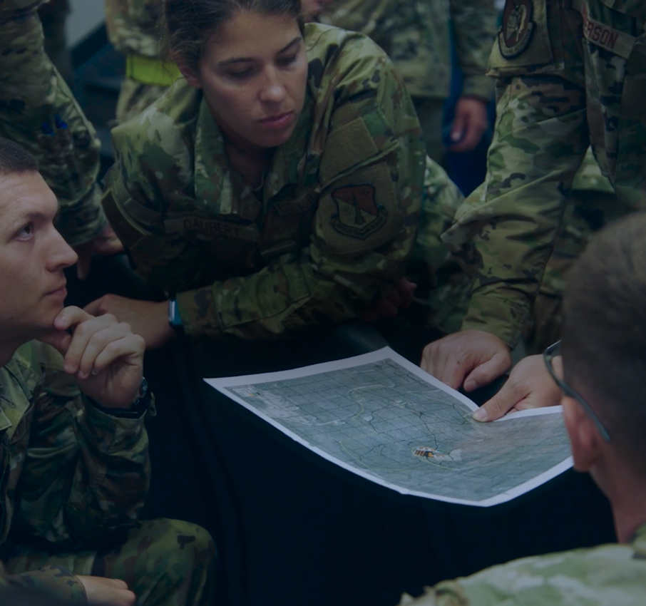 airmen reviewing a document