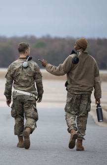 two airmen on flight line